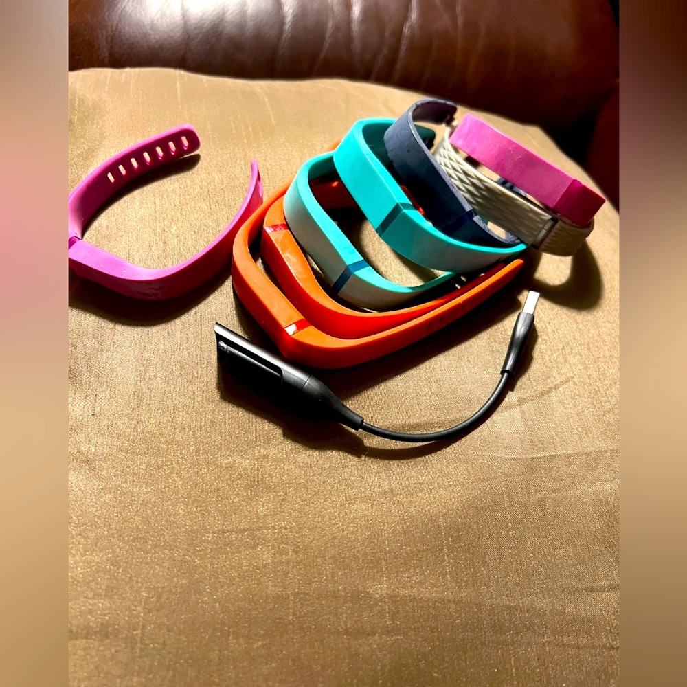 Fitbit flex charger included all bands are large except one small see picture
